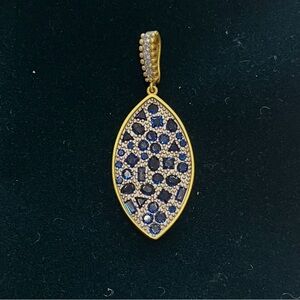 Freida Rothman Gold Tone Pendant with Blue Crystal Accents